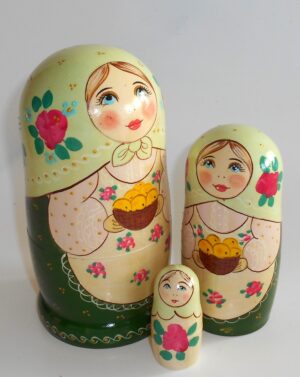 Marusya with yellow apples in green dress nesting Doll Babooshki s