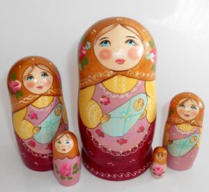 Marusya with baby in gold scarf Babushka Matryoshka nesting Doll Babooshki Babushkas