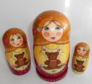 Marusya with teddy bear gold scarf nesting Doll Babooshki s