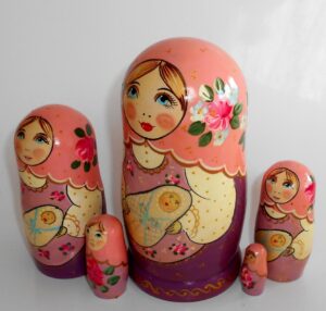 Marusya with baby in pink scarf nesting Doll Babooshki s