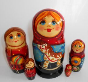 Village girl with rocking horse babushka Babushka Matryoshka nesting Doll Babooshki Babushkas