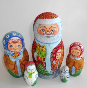 Santa with gift box and village girl babushka Babushka Matryoshka nesting Doll Babooshki Babushkas