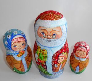 Santa with gift box and village girl nesting Doll Babooshki s
