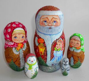 Santa with lantern and Winter village babushka Babushka Matryoshka nesting Doll Babooshki Babushkas