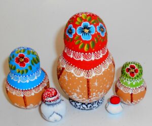 Village girl in sheepskin coat small nesting Doll Babooshki s