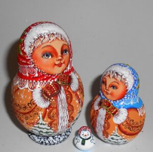 Village girl in sheepskin coat small nesting Doll Babooshki s