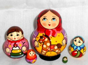 Village girl with rocking horse red scarf Babushka Matryoshka nesting Doll Babooshki Babushkas Classic Village Traditional