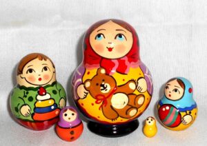 Village girl with teddy bear red scarf Babushka Matryoshka nesting Doll Babooshki Babushkas Classic Village Traditional