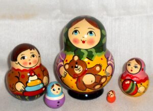 Village girl with teddy bear green scarf Babushka Matryoshka nesting Doll Babooshki Babushkas Classic Village Traditional