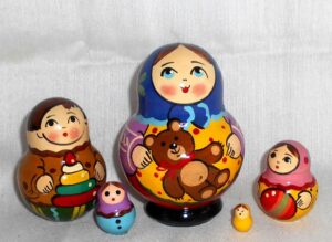 Village girl with teddy bear dark blue scarf Babushka Matryoshka nesting Doll Babooshki Babushkas Classic Village Traditional