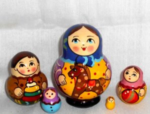 Village girl with rocking horse dark blue scarf Babushka Matryoshka nesting Doll Babooshki Babushkas Classic Village Traditional