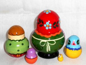 Village girl with self-made doll green dress red scarf nesting Doll Babooshki s Classic Village Traditional
