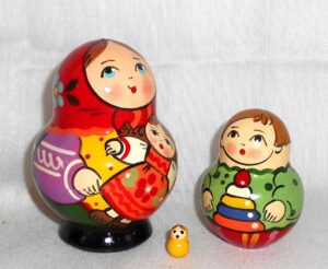 Village girl with self-made doll green dress red scarf nesting Doll Babooshki s Classic Village Traditional