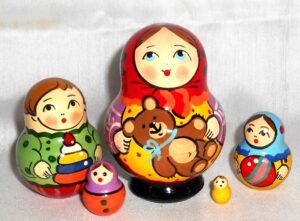 Village girl with teddy bear green dress red scarf Babushka Matryoshka nesting Doll Babooshki Babushkas Classic Village Traditional