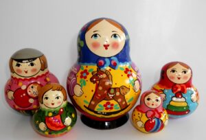 Village girl with rocking horse blue scarf 10-set nesting Doll Babooshki s Classic Village Traditional