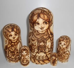 Village girls with toys Babushka Matryoshka nesting Doll Babooshki Babushkas