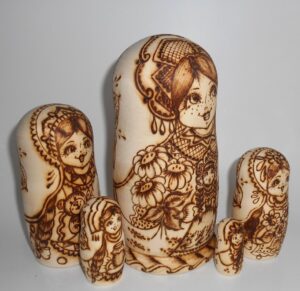 Village girls with toys nesting Doll Babooshki s