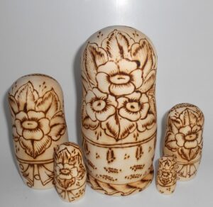 Village girls with toys nesting Doll Babooshki s