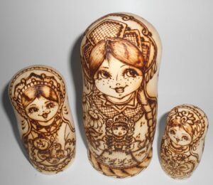 Village girls with toys nesting Doll Babooshki s