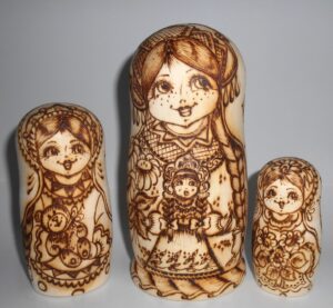 Village girls with toys nesting Doll Babooshki s