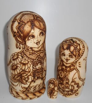 Village girls with toys nesting Doll Babooshki s