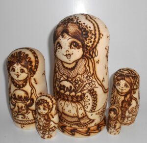 Village girls with Easter pies and eggs nesting Doll Babooshki s