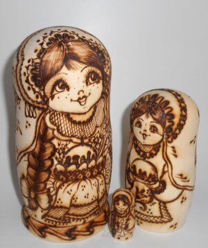 Village girls with Easter pies and eggs nesting Doll Babooshki s