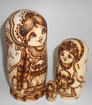 Village girls with Easter pies and eggs nesting Doll Babooshki s