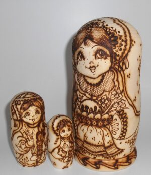 Village girls with Easter pies and eggs nesting Doll Babooshki s