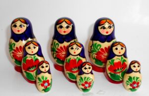 Collection of THREE Kirov purple/red 3-set Babushkas  Babushka Matryoshka nesting Doll Babooshki Babushkas Classic Village Traditional