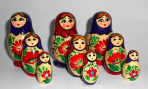 Collection of THREE Kirov purple/red & red/purple 3-set Babushkas  Babushka Matryoshka nesting Doll Babooshki Babushkas Classic Village Traditional