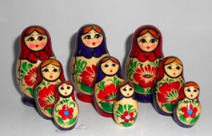 Collection of THREE Kirov red/purple & purple/red 3-set Babushkas  Babushka Matryoshka nesting Doll Babooshki Babushkas Classic Village Traditional