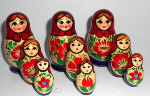 Collection of THREE Kirov red/purple 3-set Babushkas  Babushka Matryoshka nesting Doll Babooshki Babushkas Classic Village Traditional
