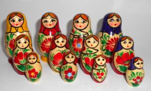 Collection of FOUR Kirov 3-set Babushkas  Babushka Matryoshka nesting Doll Babooshki Babushkas Classic Village Traditional