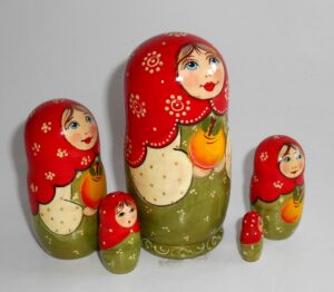 Kira in green dress with apple II small nesting Doll Babooshki s