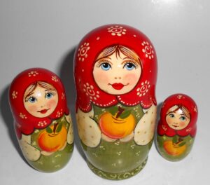 Kira in green dress with apple II small nesting Doll Babooshki s