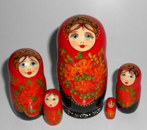 Kira in red and black with wild flowers small Babushka Matryoshka nesting Doll Babooshki Babushkas
