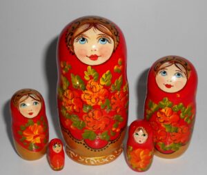 Kira in red with wild flowers small Babushka Matryoshka nesting Doll Babooshki Babushkas