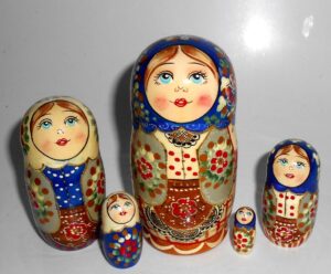 Olya in national costume blue scarf small Babushka Matryoshka nesting Doll Babooshki Babushkas