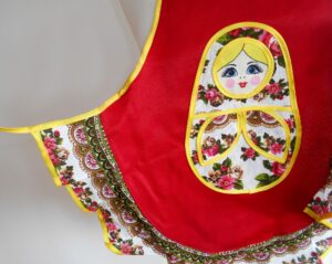 Kids Apron red and floral nesting Doll Babooshki s