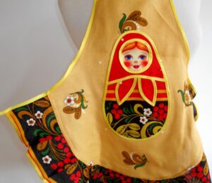 Kids Apron beige and pretty face nesting Doll Babooshki s