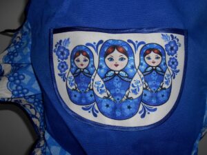 Kids Apron blue with collar ‘three s’ nesting Doll Babooshki s