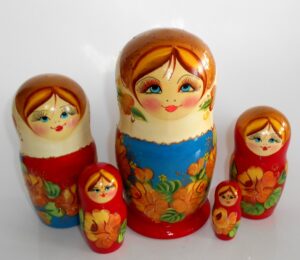 Vera in white scarf red dress Babushka Matryoshka nesting Doll Babooshki Babushkas