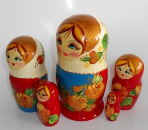 Vera in white scarf red dress nesting Doll Babooshki s