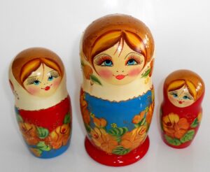 Vera in white scarf red dress nesting Doll Babooshki s