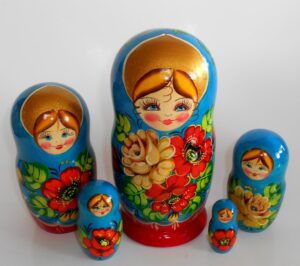 Vera in blue scarf red dress Babushka Matryoshka nesting Doll Babooshki Babushkas