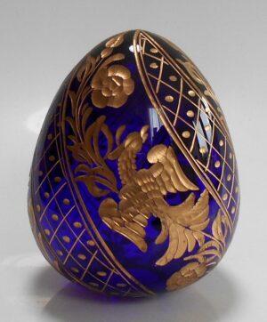 Dark blue glass egg with birds