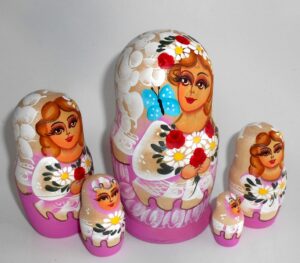 Bride in purple with roses and butterfly nesting Doll Babooshki s