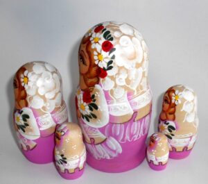 Bride in purple with roses and butterfly nesting Doll Babooshki s