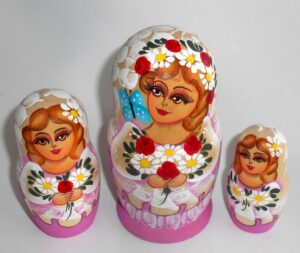 Bride in purple with roses and butterfly nesting Doll Babooshki s